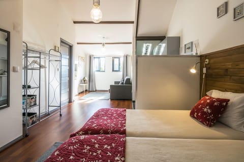 Luxury Loft, 1 Bedroom, Balcony | Living room | Flat-screen TV