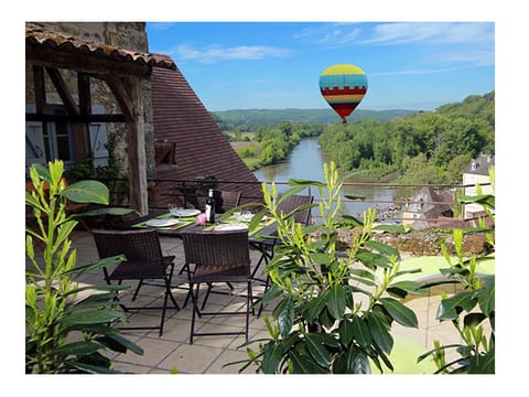Our amazing  terrace with a beautiful  view over the river.  