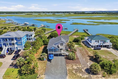 Exterior of Two Buoys And A Gull and Intracoastal Waterway