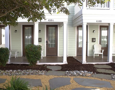 Featuring a peaceful garden path, private entry, and inviting outdoor seating—perfect for morning coffee or evening unwinding.