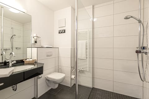 Shower, free toiletries, hair dryer, towels