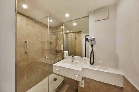 Shower, eco-friendly toiletries, hair dryer, towels