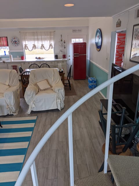 View from spiral staircase to kitchen.