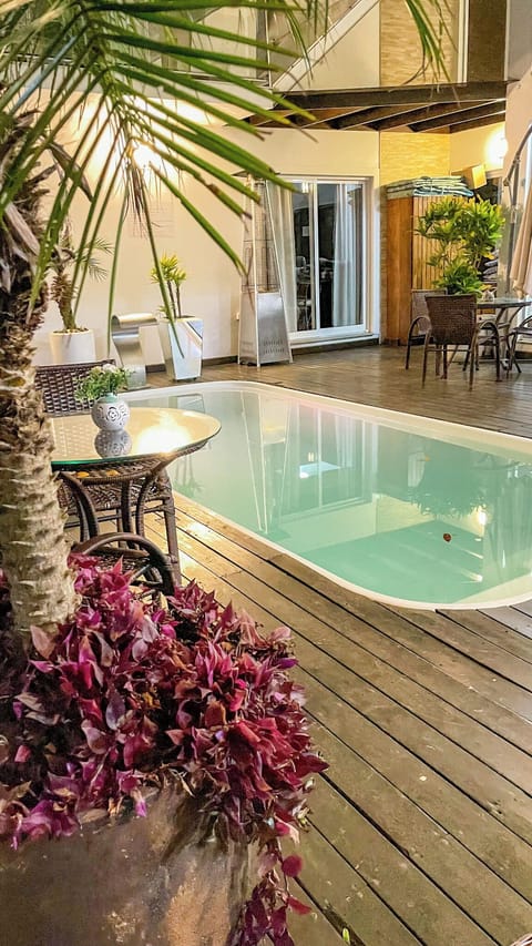Outdoor pool, open 10:00 AM to 10:00 PM, pool umbrellas, sun loungers