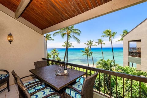 Enjoy meals overlooking turquoise waters and swaying palm trees