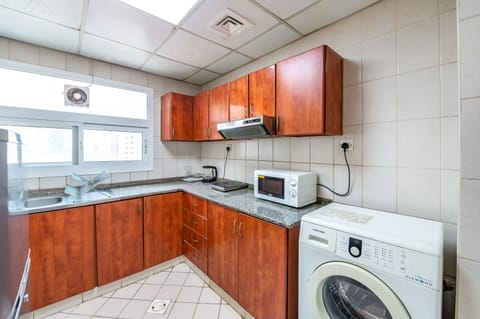 One Bedroom Apartment, King Bed | Private kitchen | Fridge, microwave