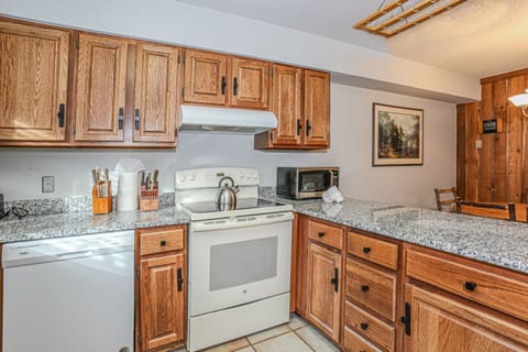 Large kitchen with new appliances and granite countertops