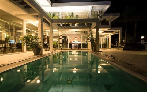 Outdoor pool, open 7:00 AM to 10:00 PM, sun loungers