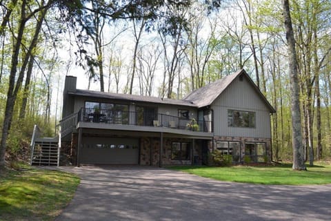 Large lakeside deck with dining and new gas grill.
