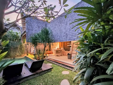 cozy romatic arch shape building called "lumbung"