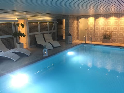 Indoor pool, open 8:00 AM to 9:00 PM, sun loungers