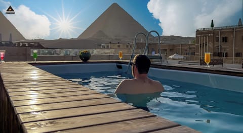 Outdoor pool, open 9:00 AM to 6:00 PM, lifeguards on site