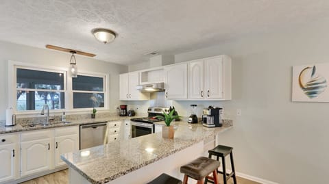 Three additional bar seats are available. 