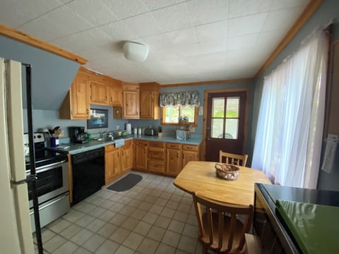 Full kitchen, dishwasher, microwave all necessities needed for cooking