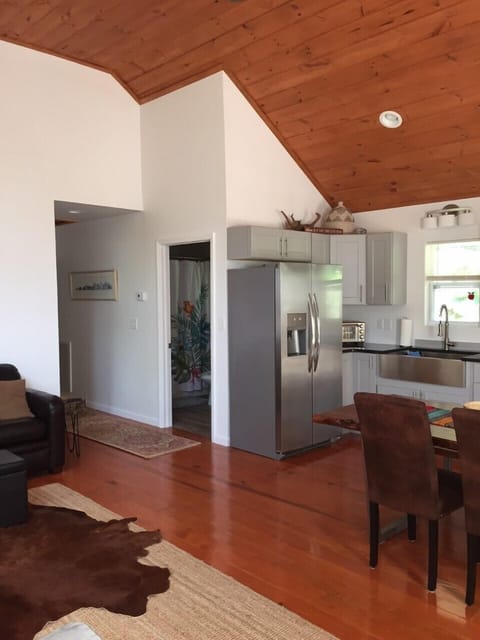 View of hallway and entrance to guest bathroom.