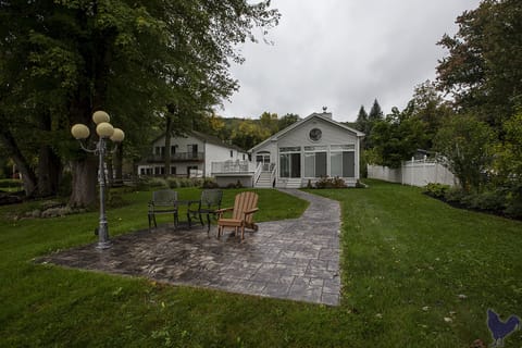 Level yard with stamped concrete patio