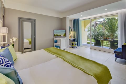 Deluxe Room, Garden View, Garden Area | Premium bedding, minibar, in-room safe, individually decorated