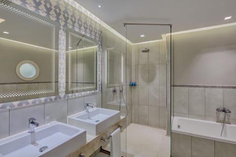 Eco-friendly toiletries, bathrobes, slippers, towels