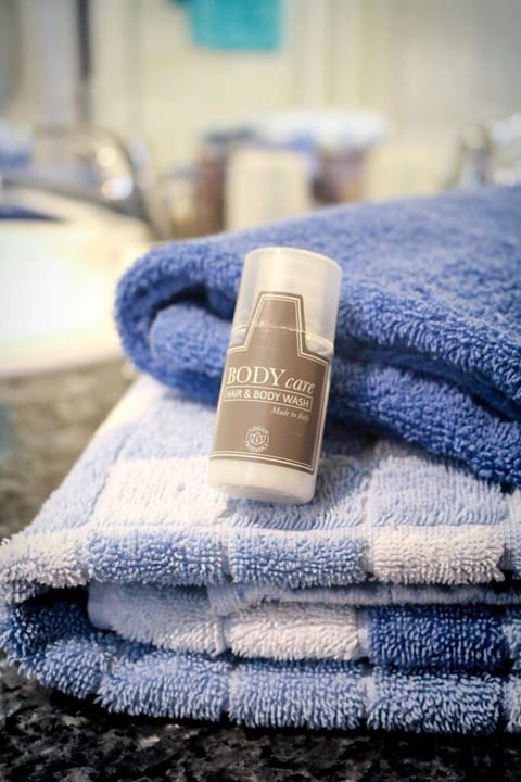 Bathtub, free toiletries, hair dryer, towels