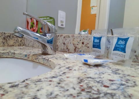 Shower, eco-friendly toiletries, towels, soap