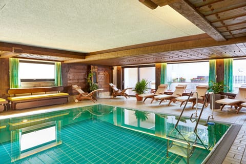 Indoor pool, open 8:00 AM to 9:00 PM, sun loungers