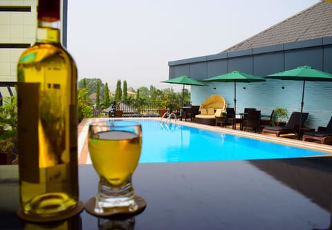 Outdoor pool, pool umbrellas, sun loungers