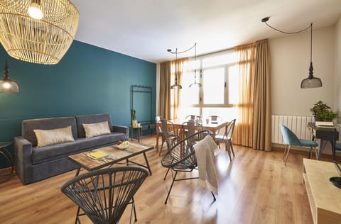 3 Bedroom Apartment, 2 Bathrooms | Living area | Flat-screen TV