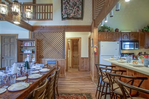 The kitchen bar seats 3.