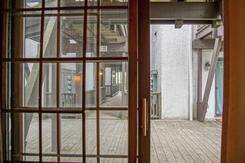 The patio doors lead out to the main walkway of this building!