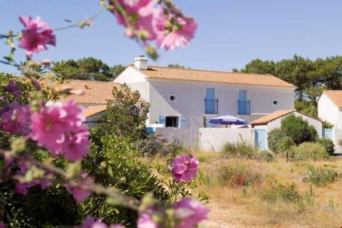 Relax in your own private garden after a wonderful day by the lake.