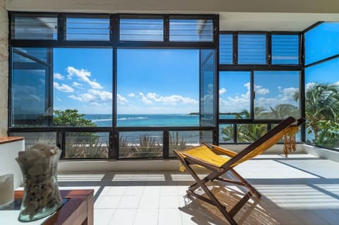 Living room view of Half Moon Bay - La Iguana condo 4, 1 bedroom Akumal vacation rental Akumal Mexico vacation rental