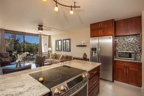 New Kitchen with cherry cabinets, granite countertops and SS appliances.