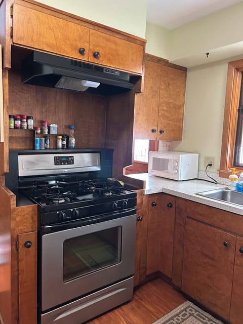 Gas stove.  Few staples provided.