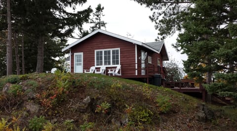 Front of cottage with patio area on the right