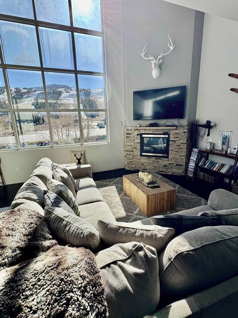 Living room with gas fireplace.