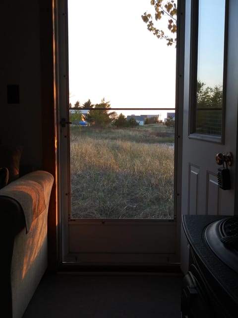 beach grass and sandy dune view from the side door while sitting in the recliner