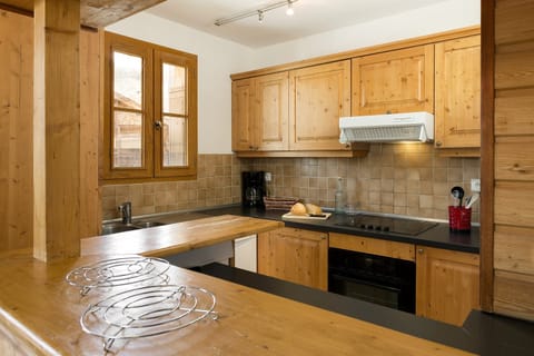 Cook up a meal in your equipped kitchen.