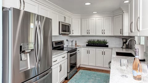 This home has 2 kitchens! Fully Equipped with Blenders, Nespresso Virtuoso and Mr Coffee regular filters. Quartzite countertops, new cabinets, and all new appliances.