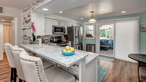 2nd Kitchen has Breakfast Bar, and separate hutch for food storage. 4 Stools for Seating.