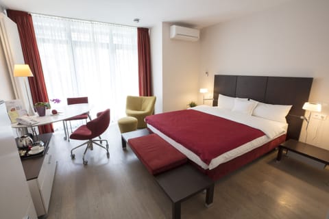 Standard Double Room | Minibar, desk, laptop workspace, iron/ironing board