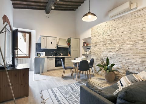 Apartment, 2 Bedrooms | Private kitchen | Full-size fridge, stovetop, highchair, cookware/dishes/utensils