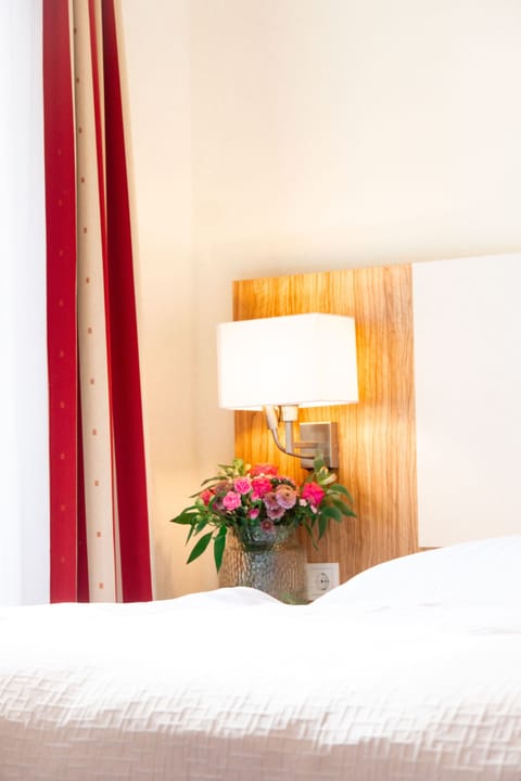 Minibar, desk, blackout drapes, bed sheets