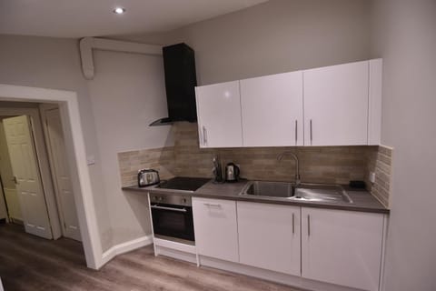 Classic Apartment, 1 King Bed with Sofa bed, Accessible, Garden View | Private kitchen | Full-size fridge, microwave, oven, stovetop