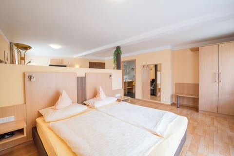 Junior Suite | Hypo-allergenic bedding, in-room safe, desk, blackout drapes