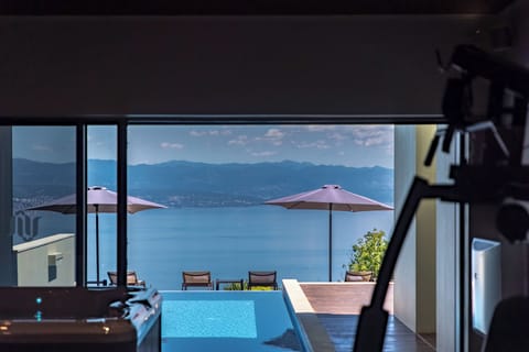 Outdoor pool, pool umbrellas, sun loungers