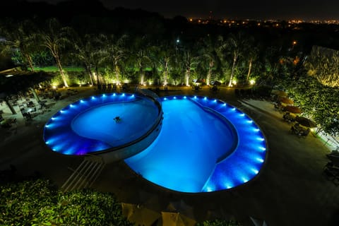 2 outdoor pools, open 10:00 AM to 10:00 PM, pool umbrellas, sun loungers