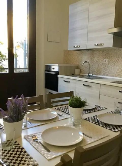Apartment, 4 Bedrooms, 2 Bathrooms | Private kitchen | Full-size fridge, microwave, oven, stovetop