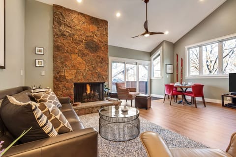 Living room and fireplace.  Breakfast table with view of mountains.  Beautiful!!
