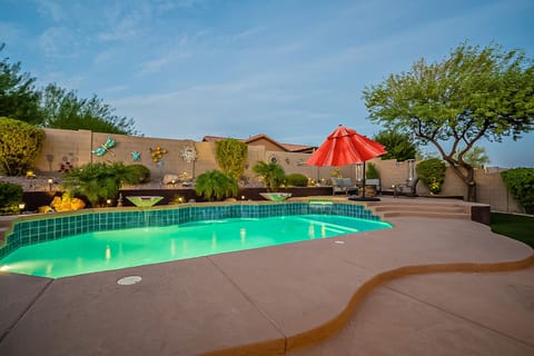 Heated pool and spa with water features.