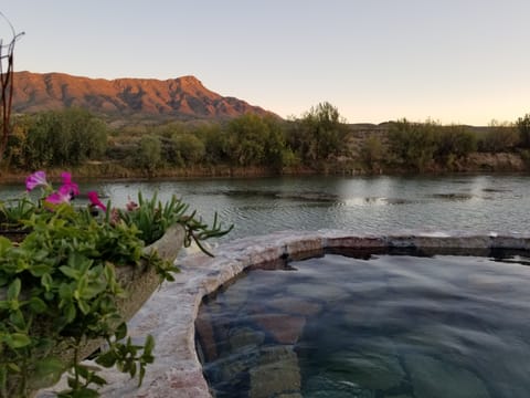 Hot Tub looking at Turtle Back Mountian at Riverbend Hotsprings